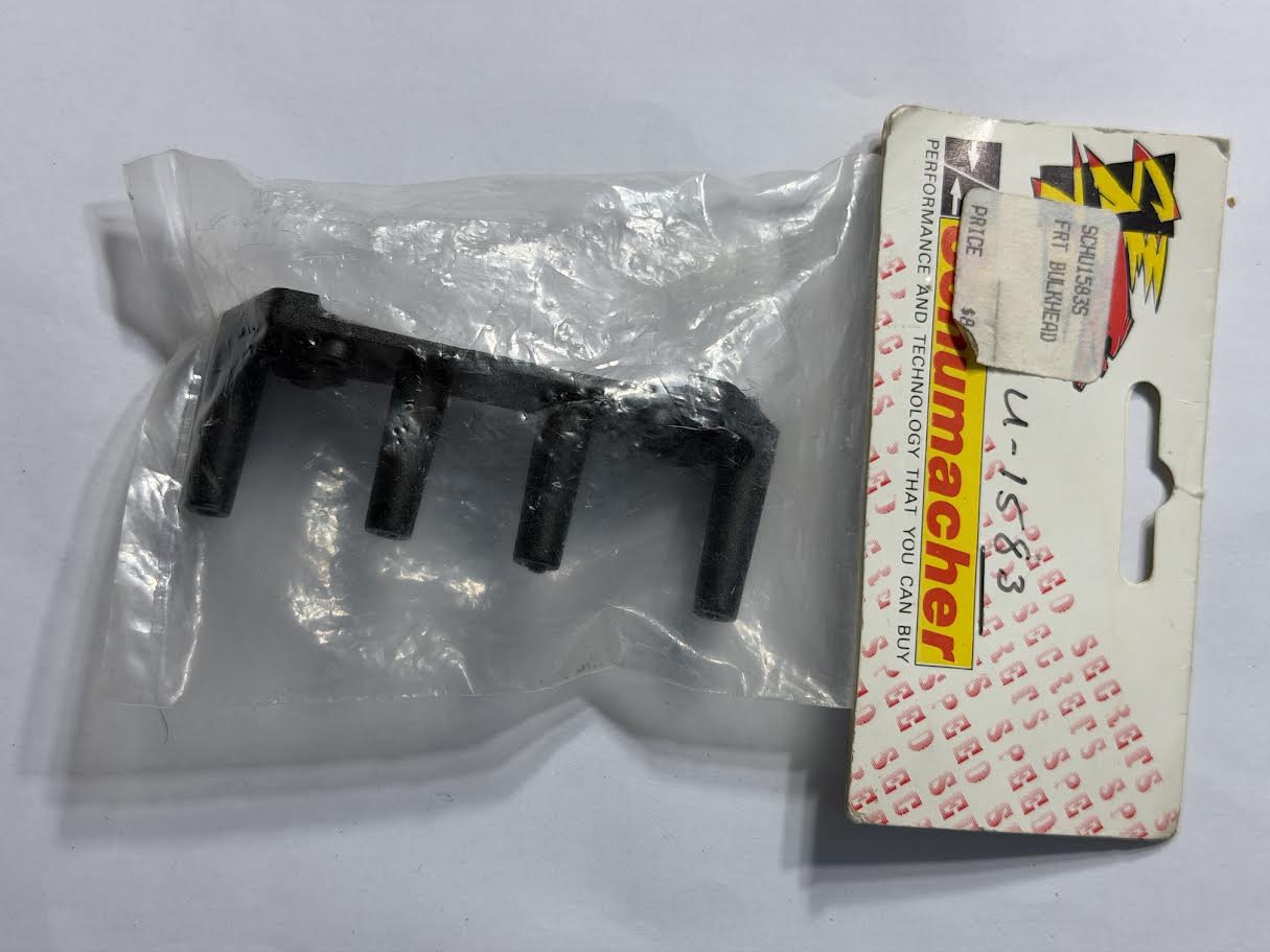 Schumacher Part #SCHU1583S Front Bulkhead Storm 2000