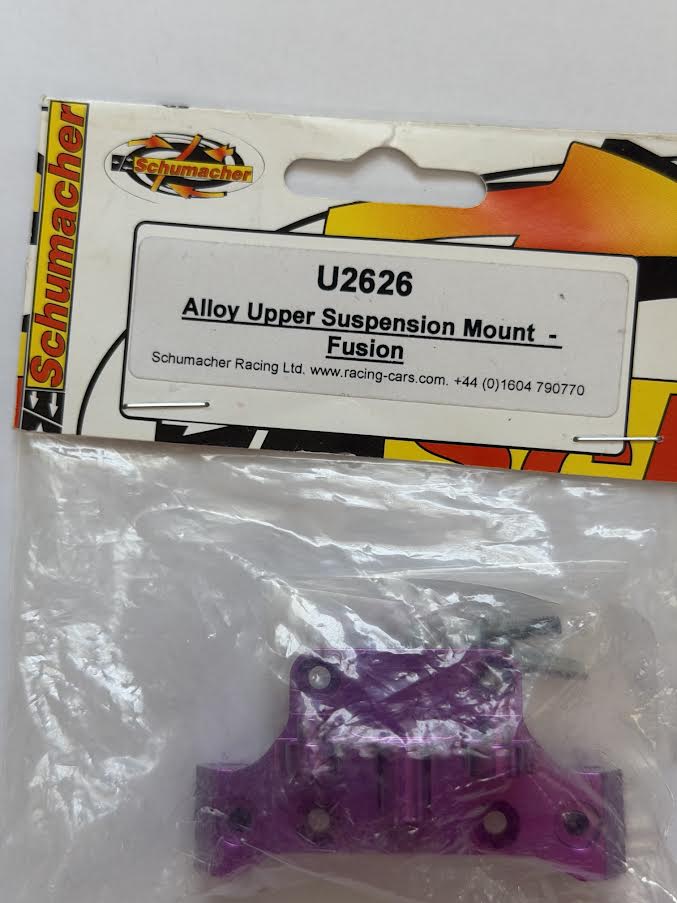 Schumacher Part #SCHU2626 Alloy Upper Suspension Mount Purple - Fusion