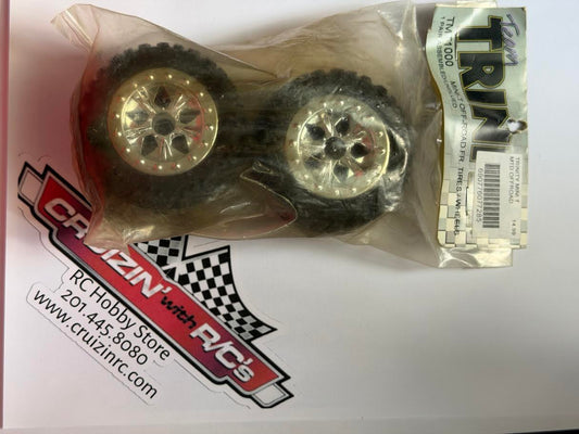 Trinity Part #TMT1000 Pre-Mounted Unglued Mini Monster Off-Road Tires & Wheels (Front)