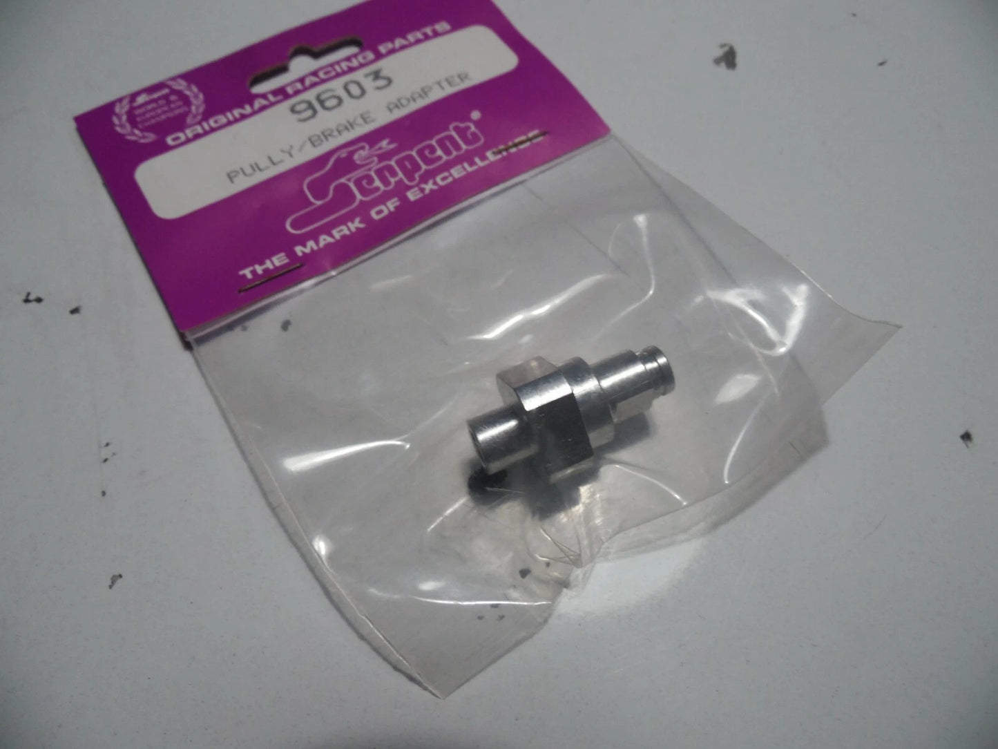 Serpent Part #SER9603 Pulley / Brake Adapter EXCEL MK1 - VINTAGE